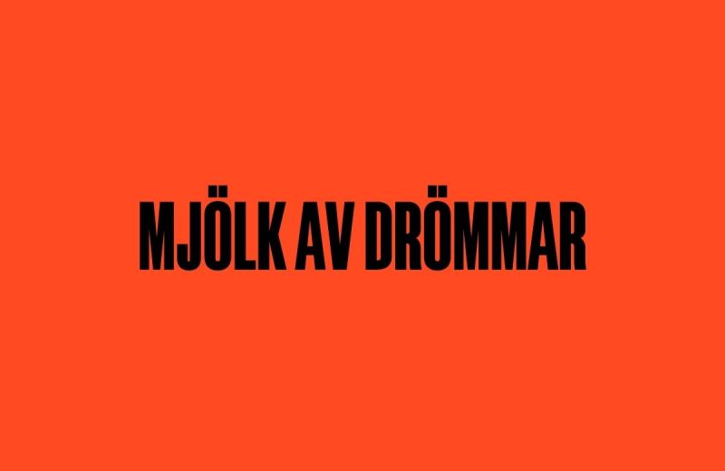 Text med ordet "Mjölk av drömmar" centrerat på röd bakgrund